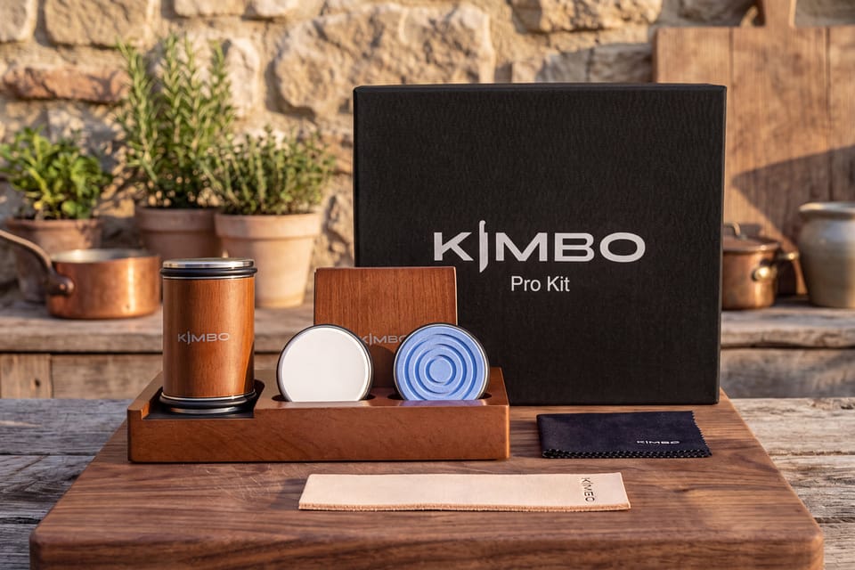 Kimbo Pro Kit in its black presentation box: rolling sharpener, magnetic angle block, whetstone discs, leather strop and microfibre cloth