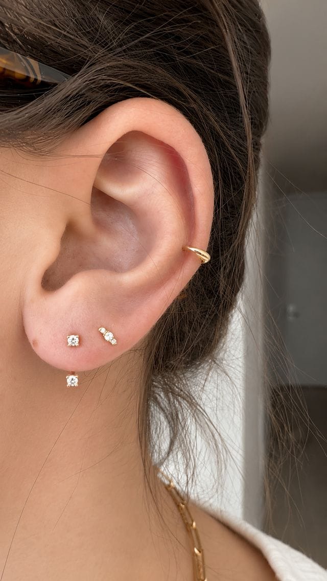 The back of an ear showing ordinary butterfly earring backs